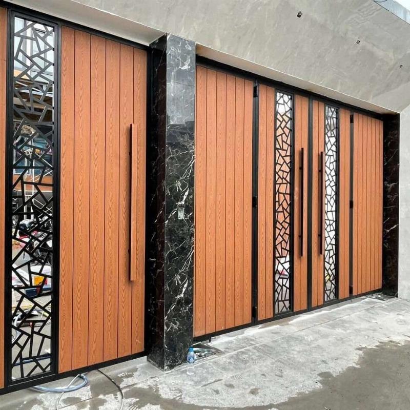 Ảnh minh họa cửa sắt với mẫu mã phức tạp và ảnh hưởng đến giá sơn tĩnh điện
